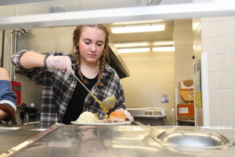 Hughesville students serve community Thanksgiving dinner